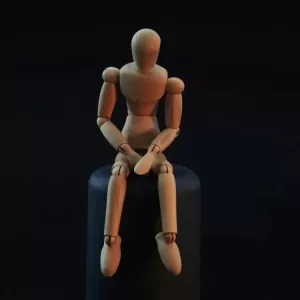 Wooden figure thinking jpg webp
